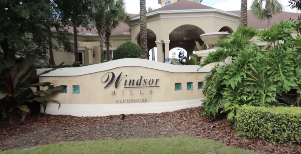 Entrance of Windsor Hills Gated Community in Orlando, FL with Palm Trees